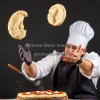 A chef tossing pizza dough in the air