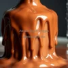 A close-up of melting chocolate cascading down a fountain