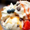 A decadent ice cream sundae with toppings