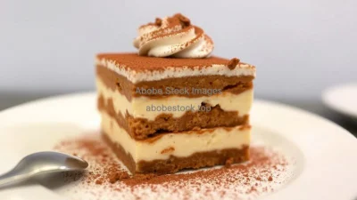 A decadent tiramisu dusted with cocoa