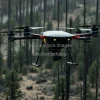 A futuristic drone reforesting a burned forest