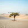 A lone tree surviving in a desertified landscape with sand dunes encroaching environmental portrait