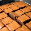 A pan of brownies cut into perfect squares