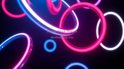 Abstract neon rings floating in darkness