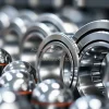 Ball bearing production line with highly polished spheres and rings macro reflections technical beauty