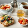 Breakfast table with whole grain toast fruit salad and green tea