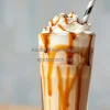 Coffee frappe with caramel and chocolate drizzle