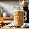 Coffee smoothie with banana and oats in blender jar