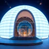 Futuristic exhibition center with glowing shell