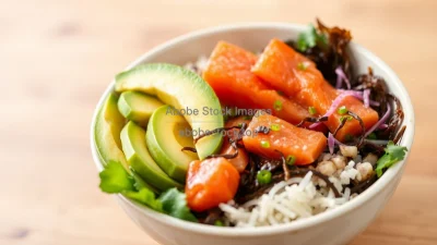 Healthy colorful poke bowl with salmon avocado and seaweed