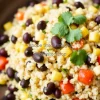 Healthy quinoa salad with black beans corn and cilantro
