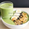 Healthy smoothie bowl with spinach banana and peanut butter