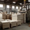 Industrial ceramics factory forming and firing tiles stacks of finished products leading lines