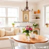 Kitchen breakfast nook with bench seating and floral arrangement