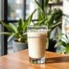 Oat milk latte in clear glass