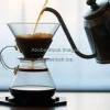 Pour-over coffee in glass dripper