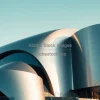 Ultra modern museum with curved metallic exterior