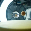 Vacuum chamber experiment showing objects in free fall microgravity demonstration clean lab