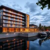 Waterfront hotel with reflective modern design